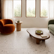 Haven White Terrazzo-Look Tile as a living room floor. Reference installation photographed by our supplier.