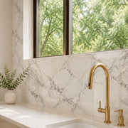 Pietra Alba Marble-Look Tile as a kitchen splashback. Reference installation photographed by our supplier.