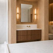 Pietra Luna Marble-Look Tile on a bathroom vanity wall and floor. Reference installation photographed by our supplier.