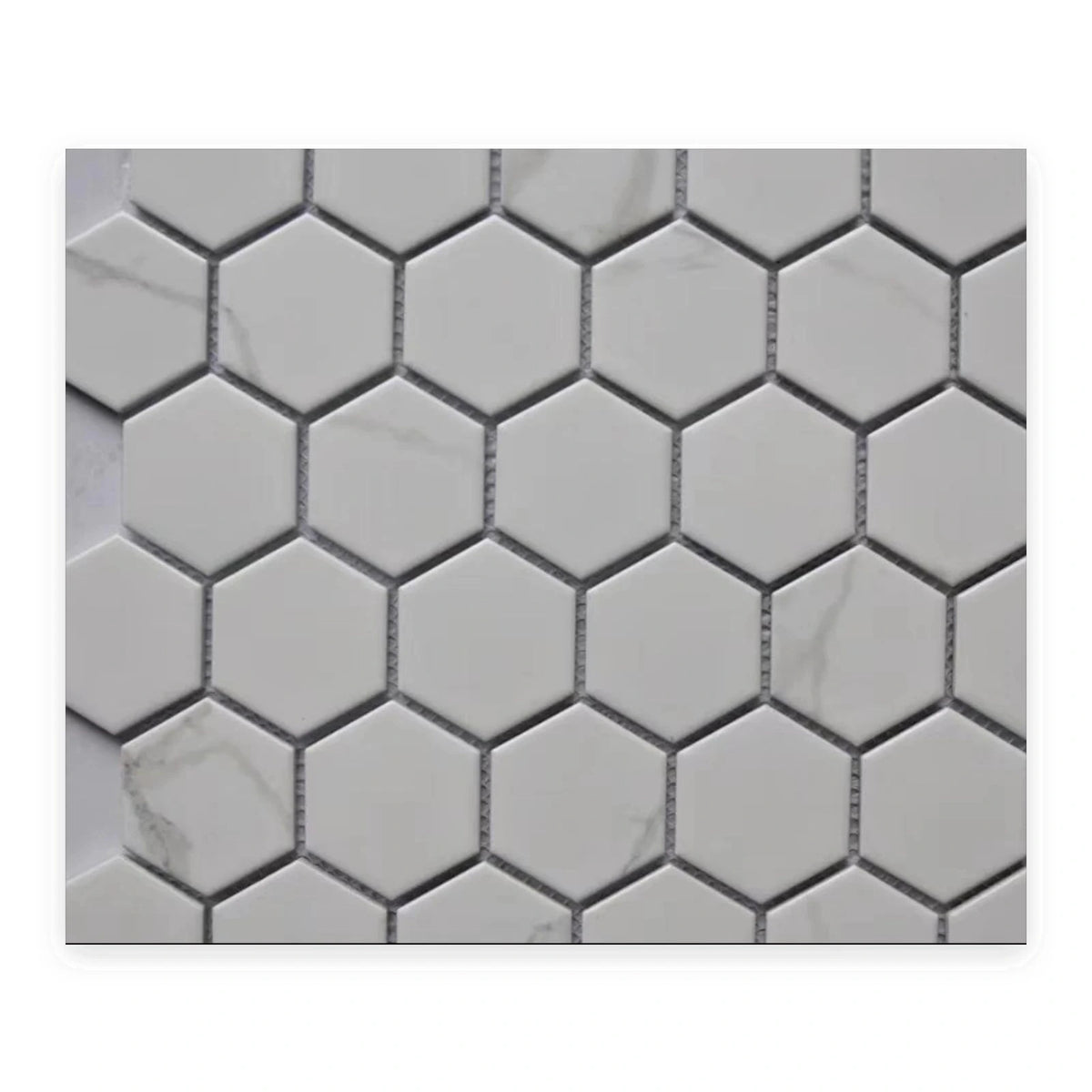 Carrara Hexagon Mosaic Tile shown on a white background